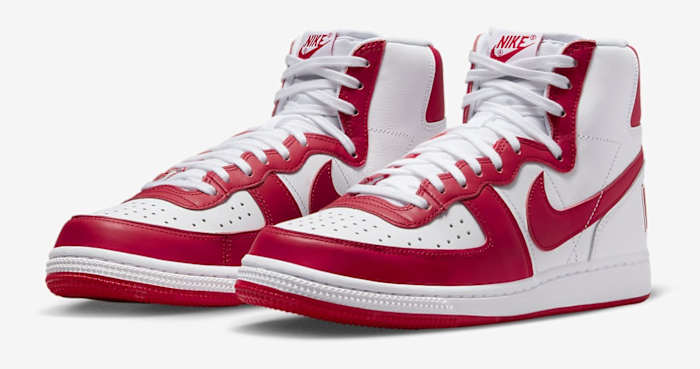 Side view of red and white Nike Terminator shoes.